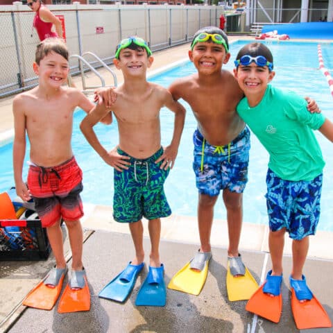 Campers wearing swim flippers.