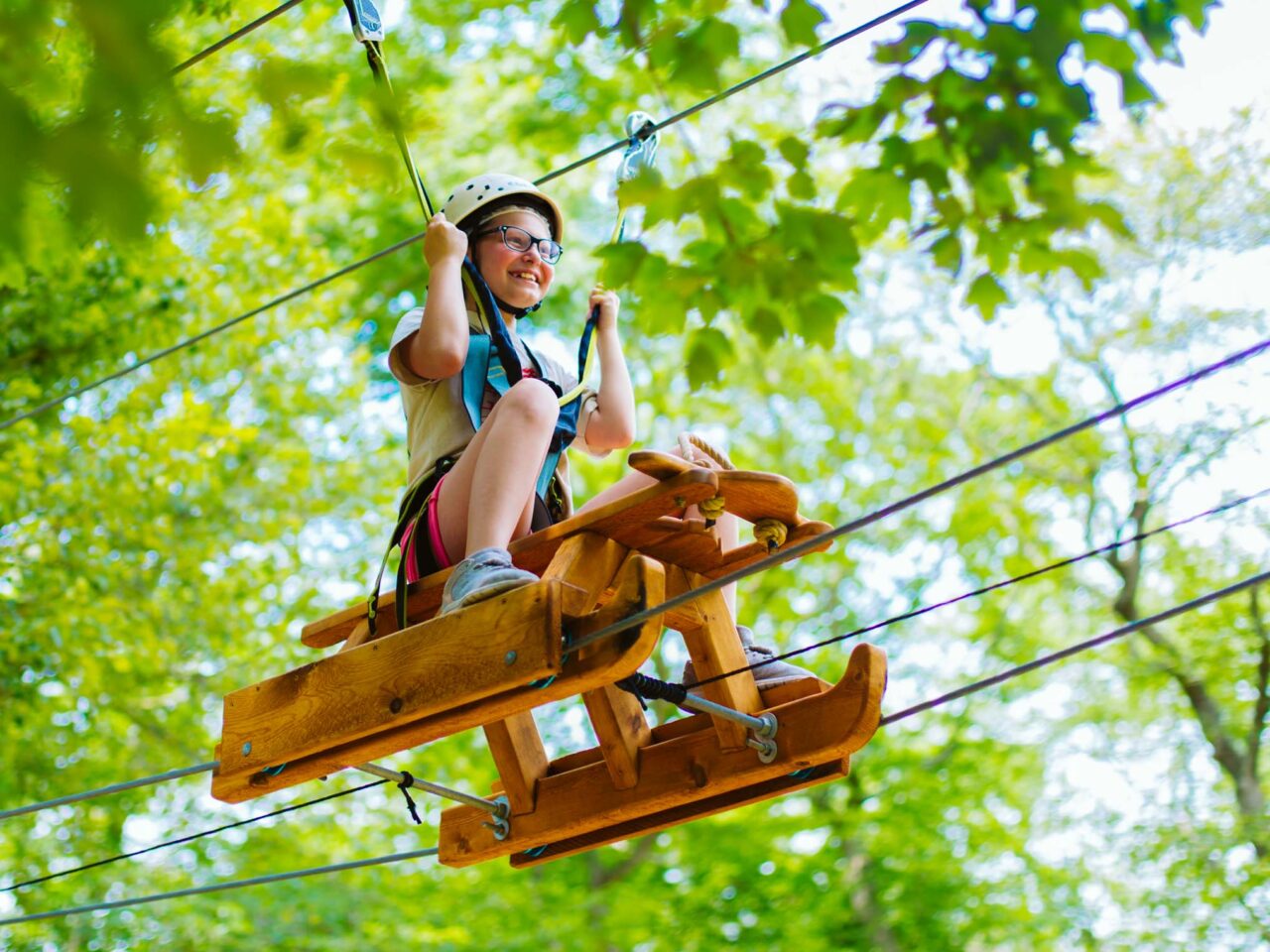 Camper sits on zipline vehicle