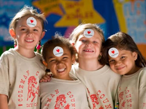 Campers with CCDC stickers on their foreheads.